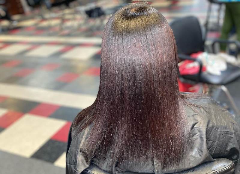 flat ironed relaxed hair