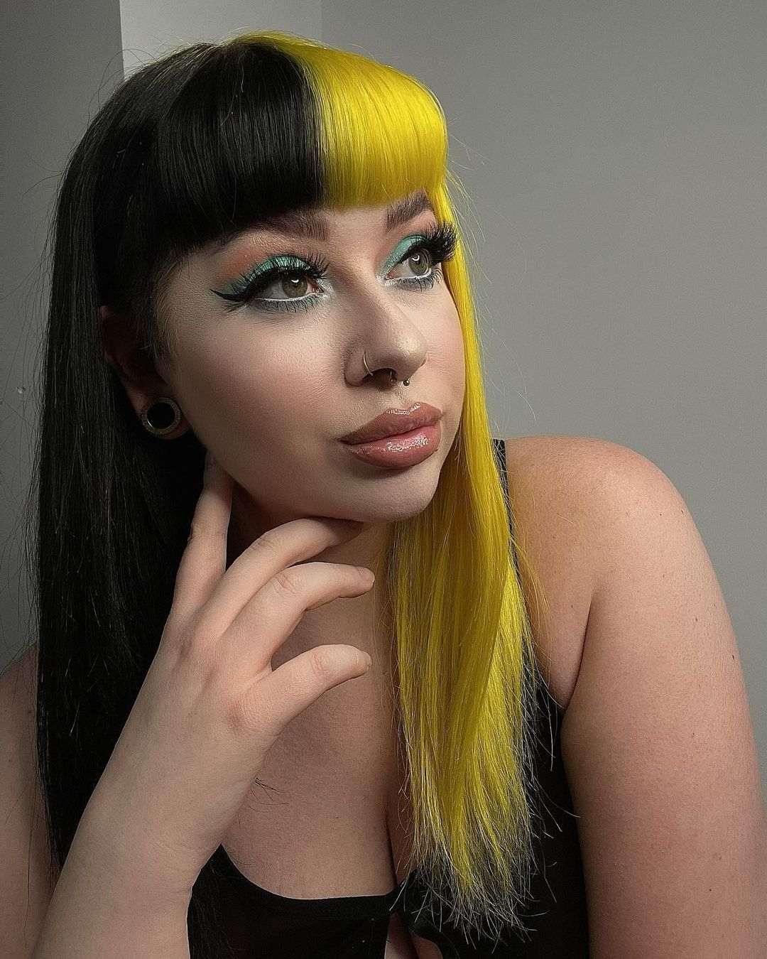 Black and yellow split hair
