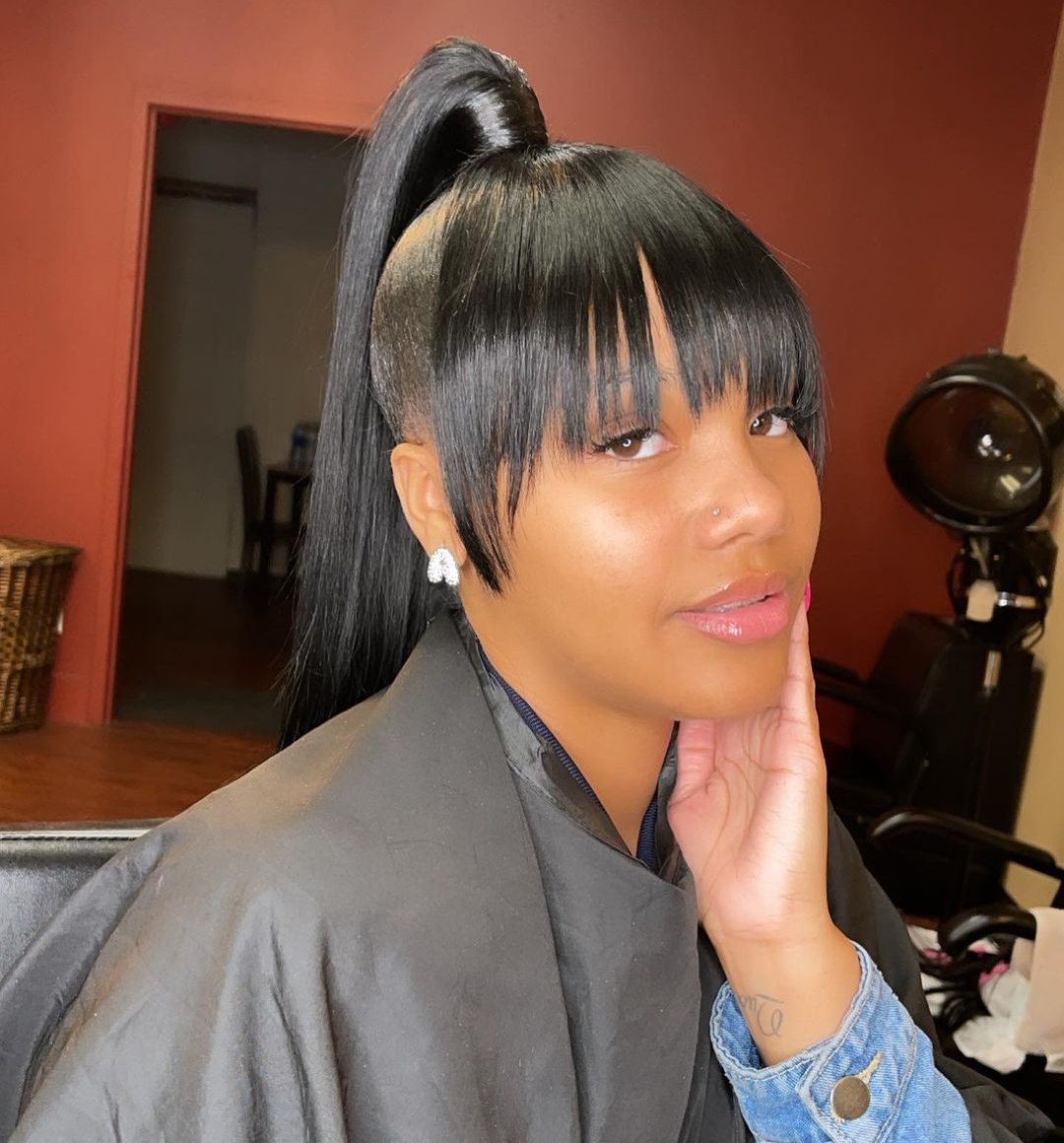 Choppy bangs with weave ponytail
