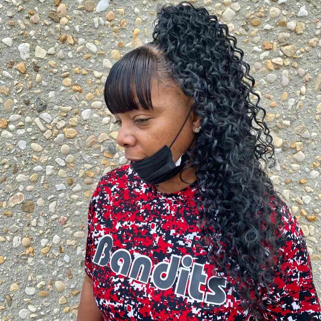 Choppy bangs with weave ponytail