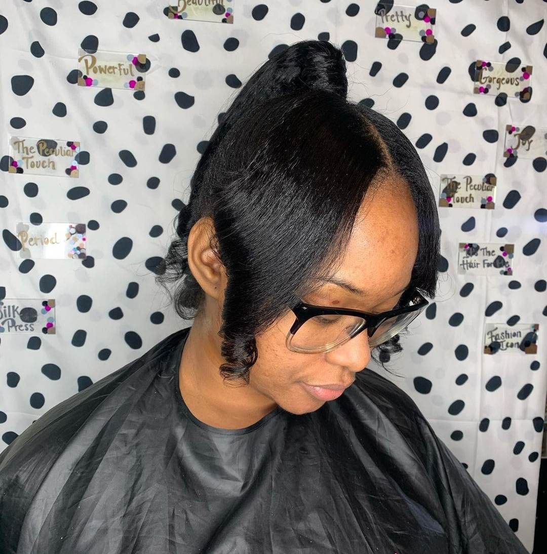 black hair ponytail styles with bangs